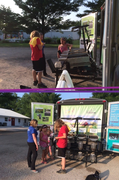 We invited one enthusiastic girl (in pink) to help teach the Rainfall Simulator (with the help of Ann) to her cousin, which she excitedly did at the Dallas County Fair.